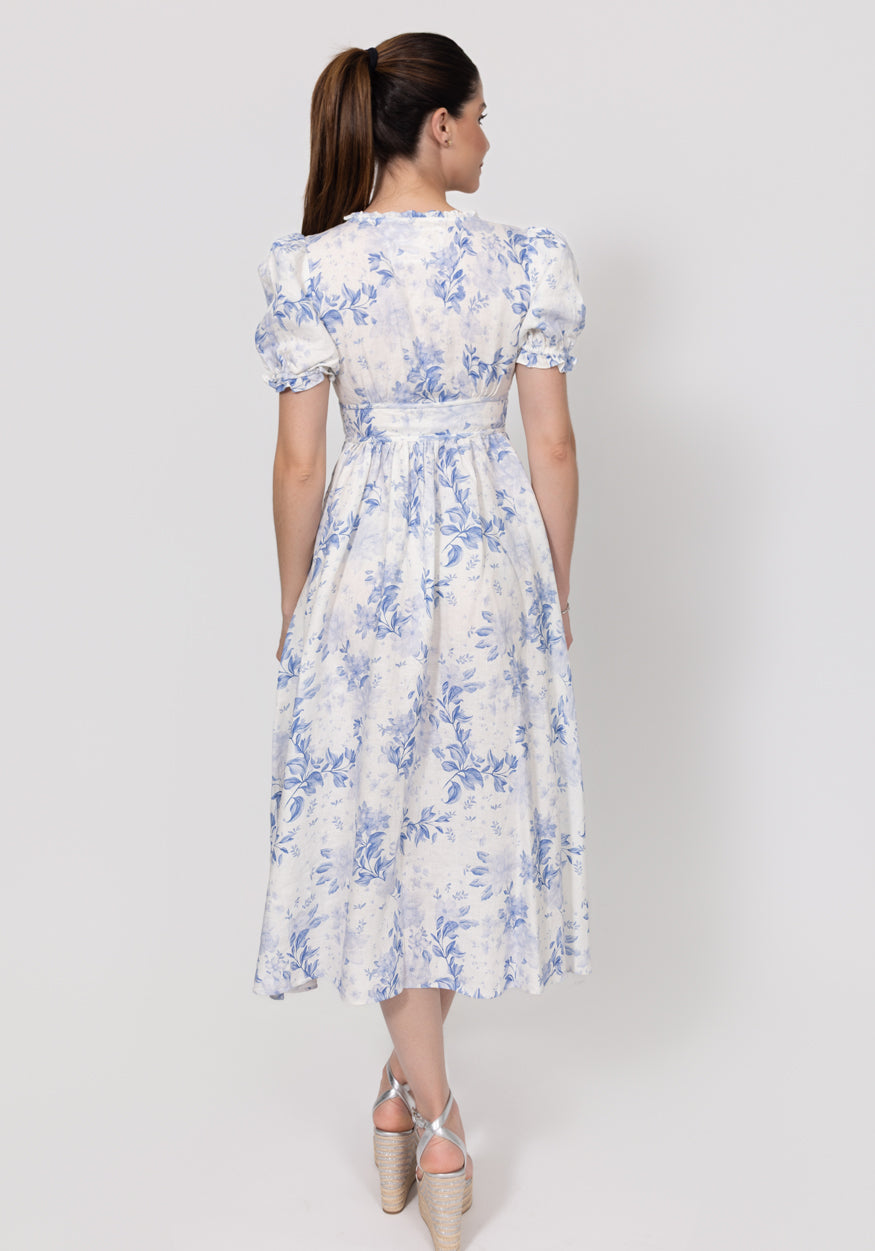 Woman wearing a floral dress on a white background